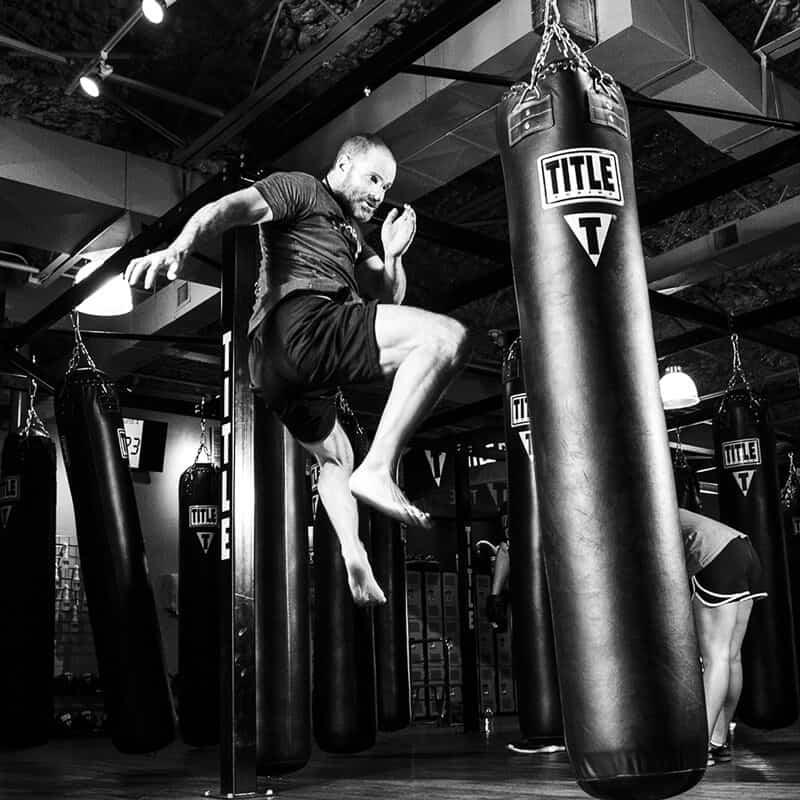 Mixed Martial Arts Lessons for Adults in Springfield VA - Flying Knee Black and White MMA